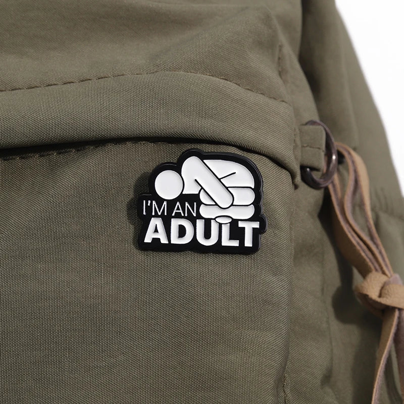 “I’m An Adult” Enamel Pin – Mental Health Humor Accessory